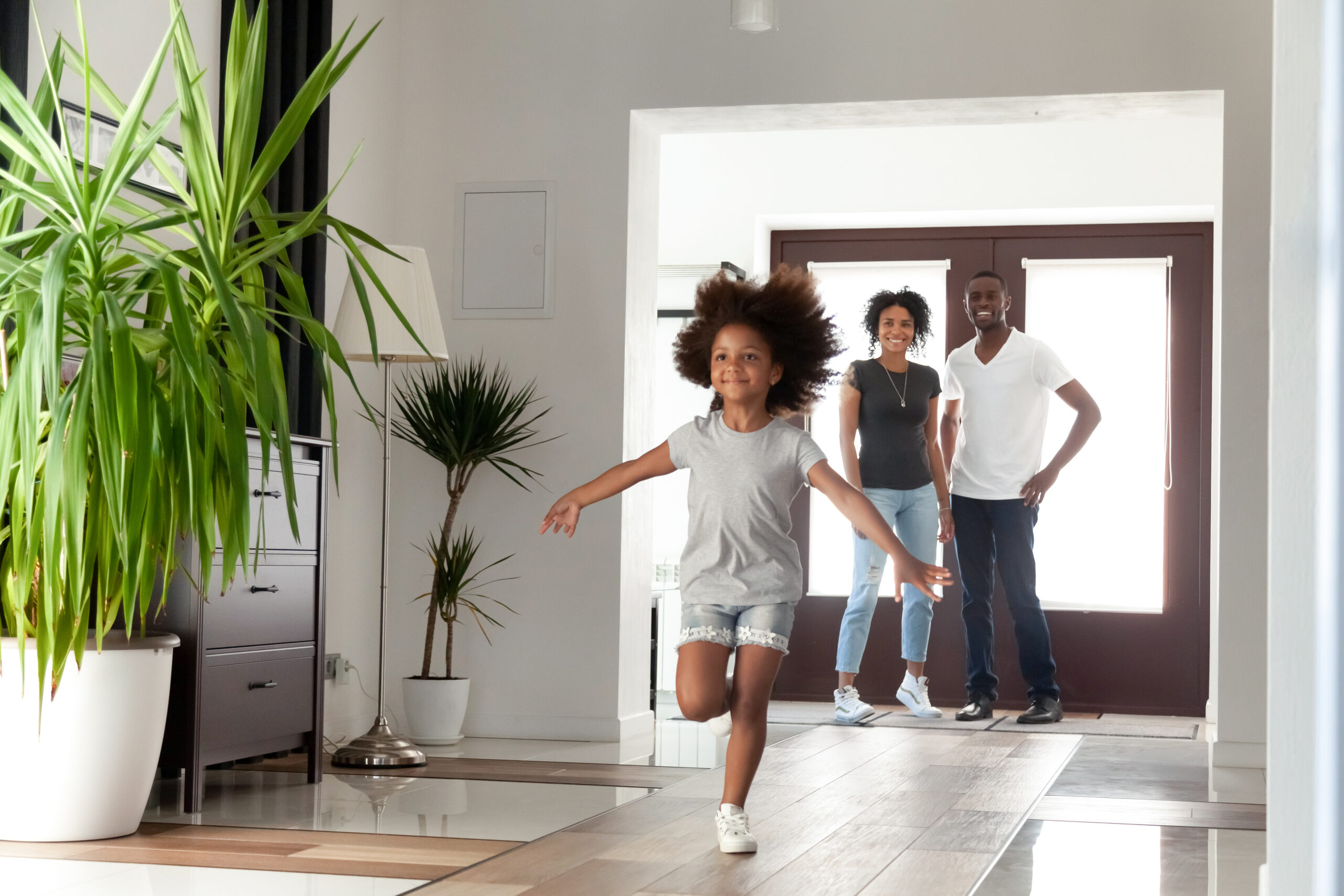 Excited,Little,Funny,African,Girl,Running,Exploring,Big,Modern,House